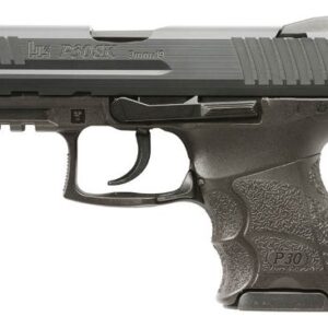 Black compact handgun, side view.