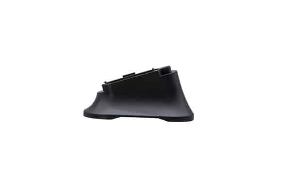 Black plastic electronic device charging dock.