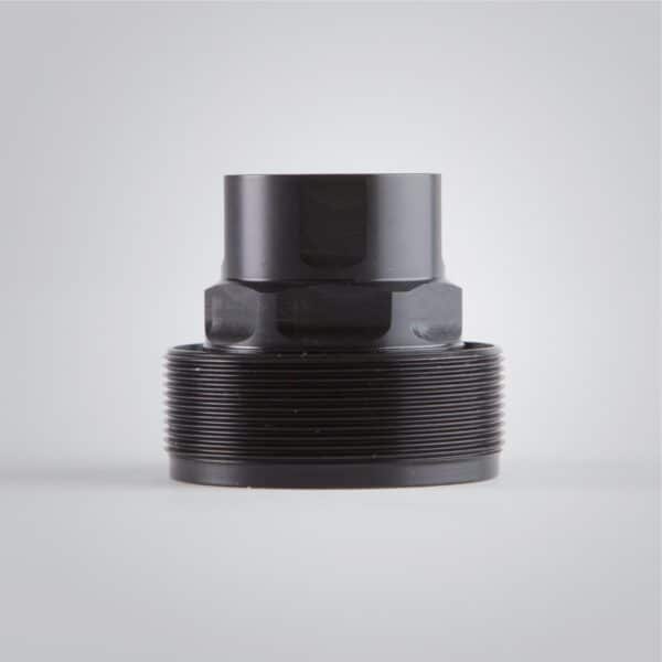 Black threaded pipe fitting close-up