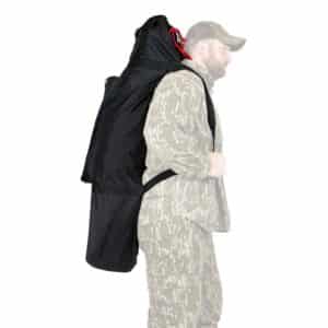 Man carrying archery equipment bag