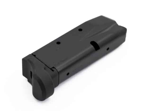 Black handgun magazine clip isolated on white background.