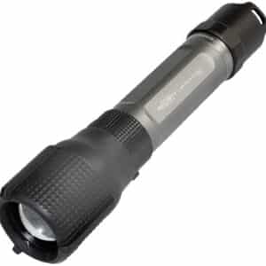 Black tactical flashlight with textured grip