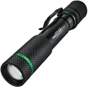 Black tactical flashlight with textured grip