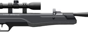 Black air rifle with attached scope, side view.