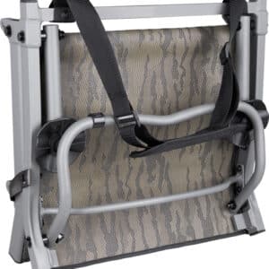 Folded portable chair with straps and metal frame.