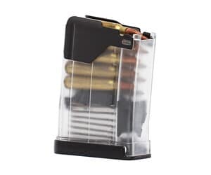 Rifle magazine with visible ammunition rounds.