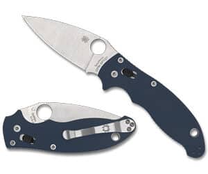 Folding knives with dark handle on display.