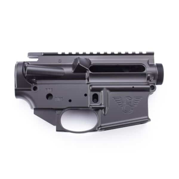 Black rifle lower receiver on white background.
