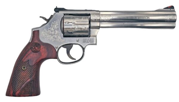 Smith & Wesson engraved revolver with wooden grip.