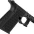 Black textured pistol grip, close-up view.