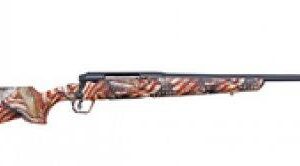 Camouflage-pattern rifle with long barrel.
