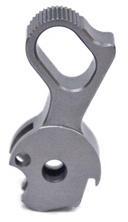 Gray metal safety selector lever for rifles.