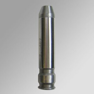 Metal bullet mold on gray background