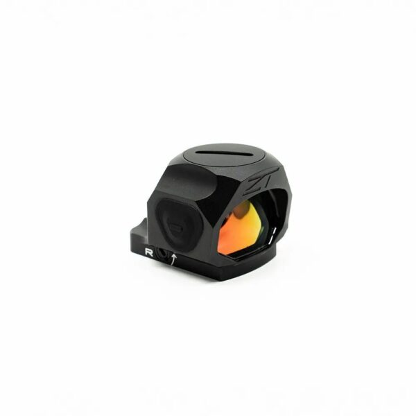 Compact black reflex sight with red-tinted lens.