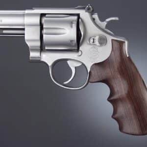 Silver revolver pistol with wooden handle